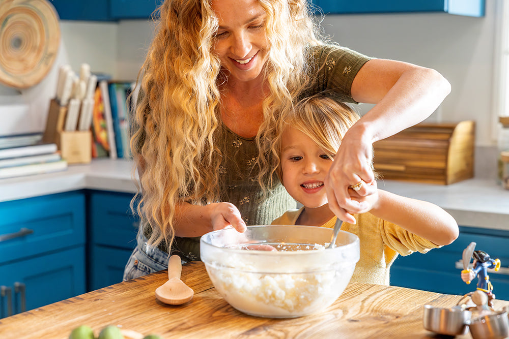 Mother and child cooking together
